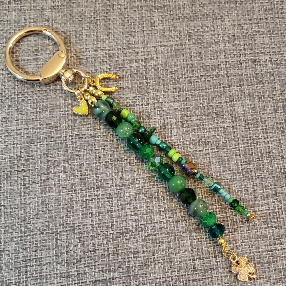 Chic Green Beaded Bag Charm with Gold Lucky Charms